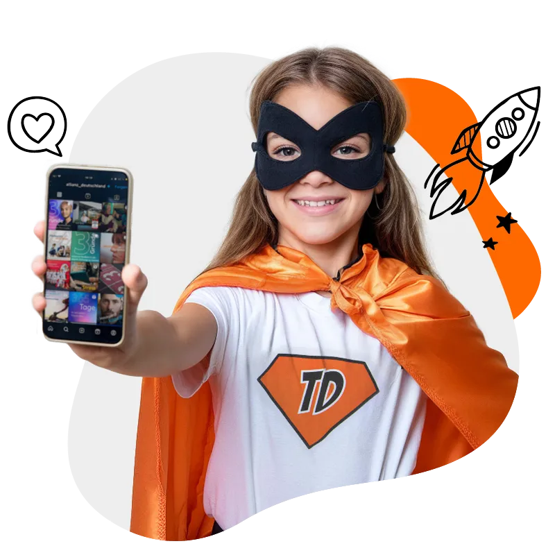 the-digitale-gmbh-münchen-social-media-agentur_warum Herokid zeigt Handy mit Social Media